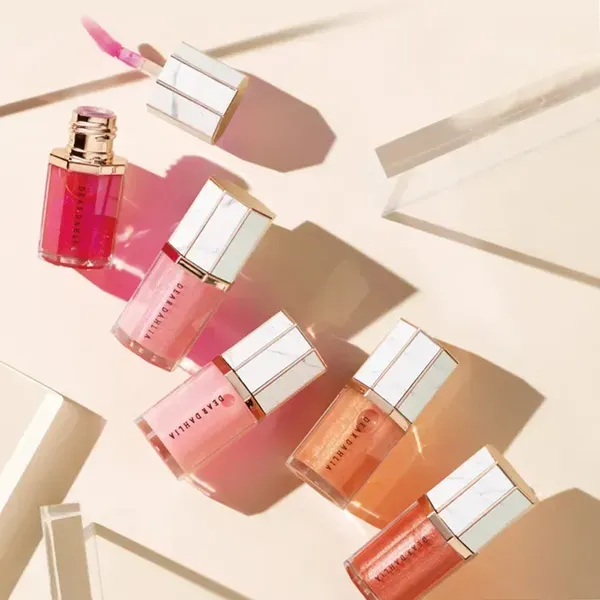 Son Bóng Chăm Sóc Môi Dịu Nhẹ Dear Dahlia Paradise Aurora Shine Lip Treatment (6.5Ml)